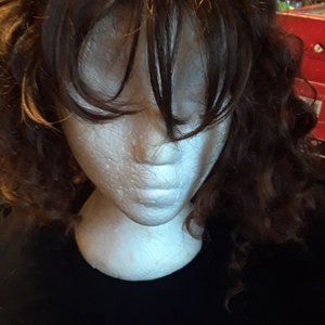 Halloween deal. Dark brown /black curly wig with bangs.